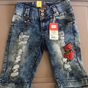 DISTRESSED ABOVE KNEE SHORTS